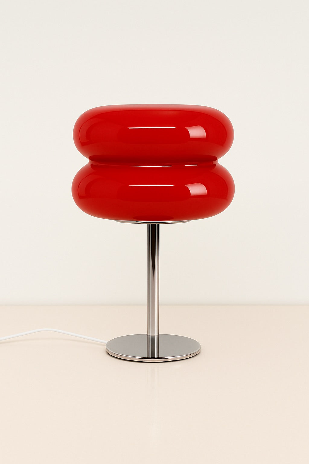 Deep red GlowPop lamp with curved silhouette and dimmable LED glow for nightstands or reading areas