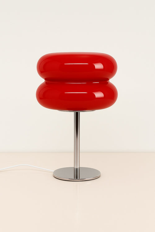 Deep red GlowPop lamp with curved silhouette and dimmable LED glow for nightstands or reading areas