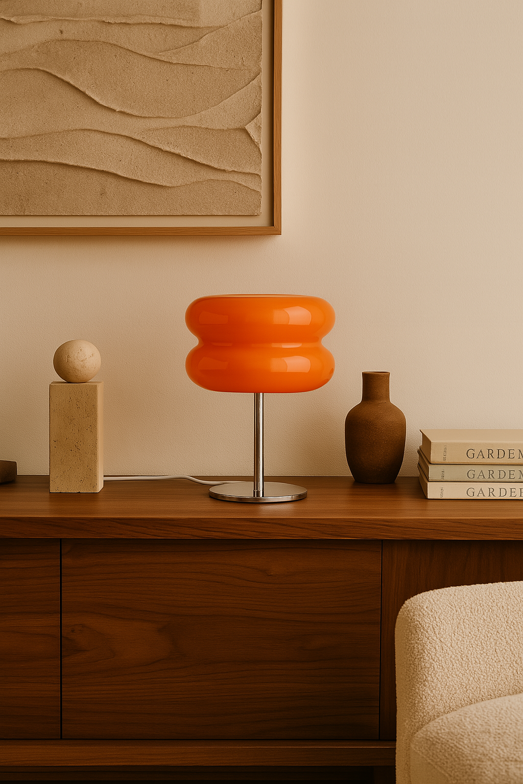 GlowPop Tangerine Orange LED dimmable lamp styled on a mid-century credenza in a retro Palm Springs room