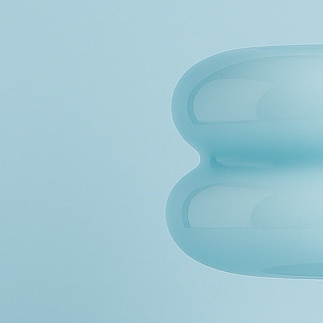 Pale blue modern lamp with a glowing translucent finish
